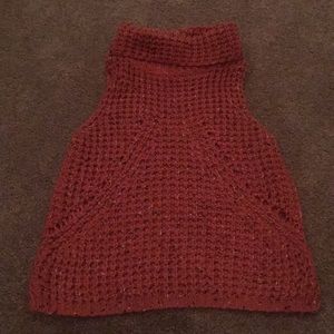Orange turtle neck sleeveless sweater